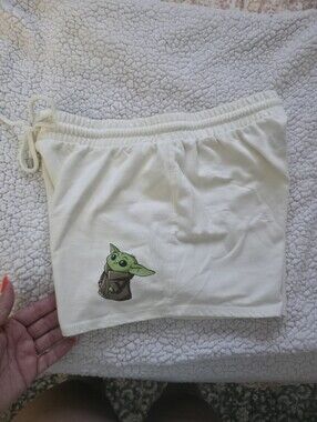 Cream Women's Lounge Shorts with Green Character Graphic